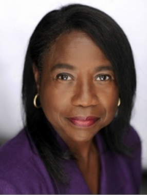 portrait photo of adilah barnes in purple blouse