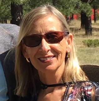 photo of linda werner smiling in sunglasses