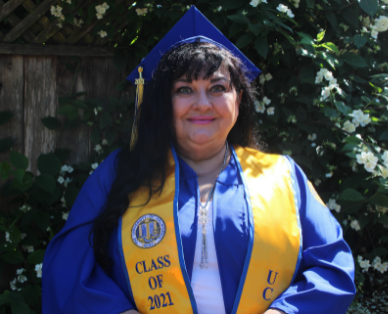 photo of karoli clever in her cap, gown and stole