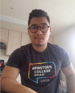 trung pq nguyen smirking with first gen college grad shirt