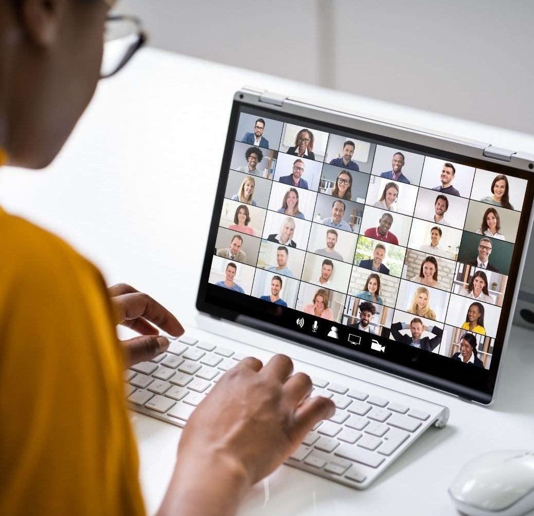 student in online meeting on their laptop